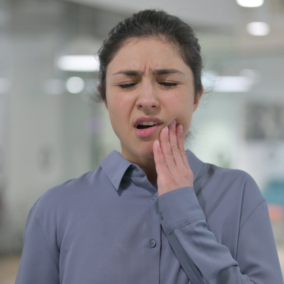 Portrait of Young Indian Woman having Toothache, Cavity
