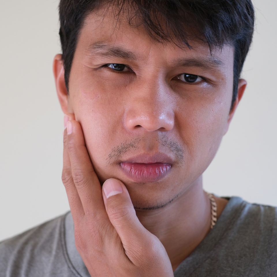 Teetch problem. Asian male with painful cheek swelling or dental abscess. A facial injury, tooth abscess, salivary stones, salivary gland tumor.