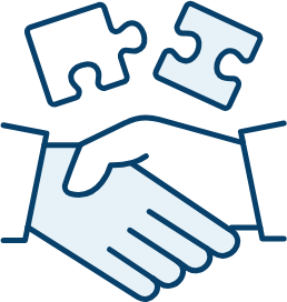 Teamwork handshake with puzzle pieces
